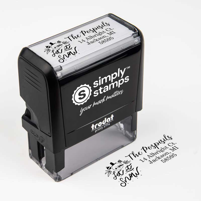 Top angle view of self-inking holiday stamp with ‘Let It Snow Winter Snowman’ address design.