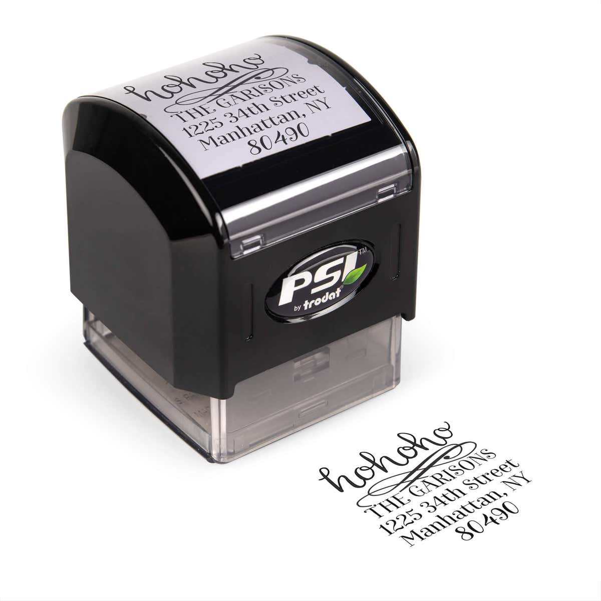 Pre-inked stamp shown from above featuring custom ‘HoHoHo Christmas’  holiday return address design.
