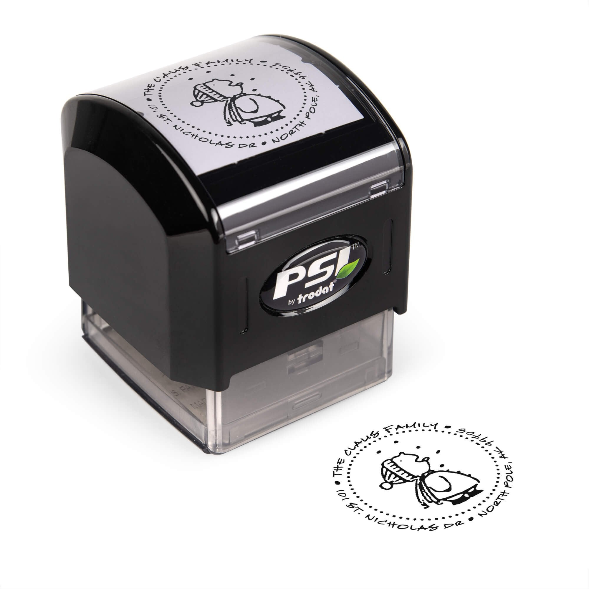 Pre-inked stamp shown from above featuring custom ‘Cute Snowflake Catcher’  holiday return address design.