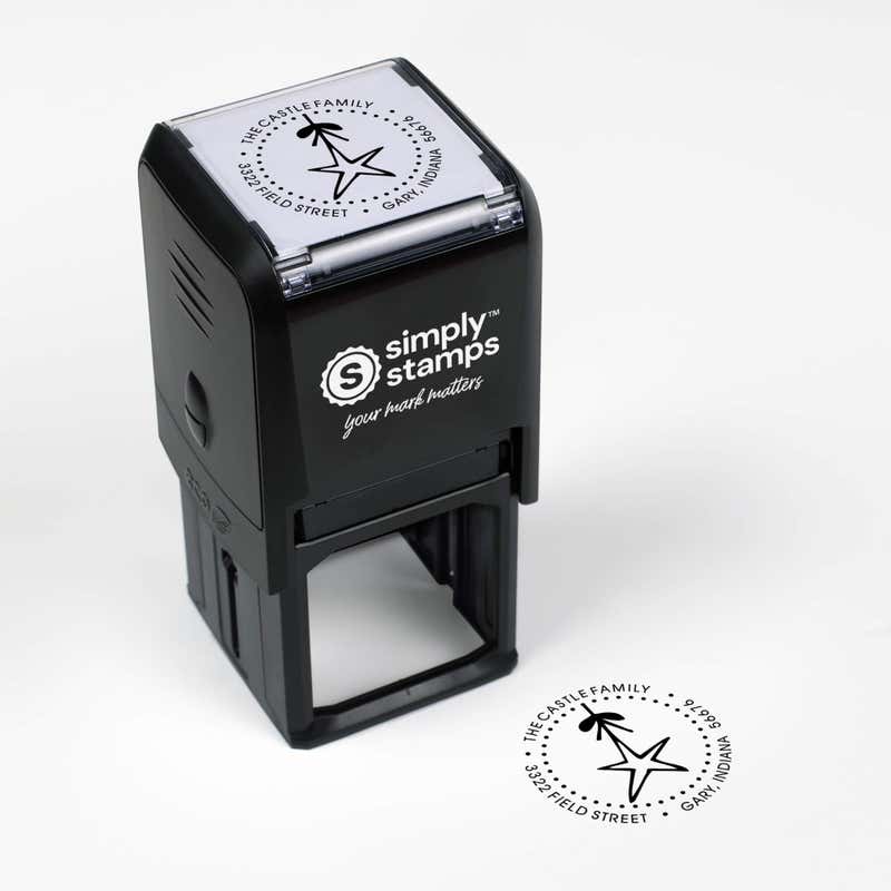 Top angle view of self-inking holiday stamp with circular ‘Holiday Star’ address design.