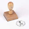 European wood hand stamp shown from above featuring custom ‘Holiday Star’ holiday return address design.