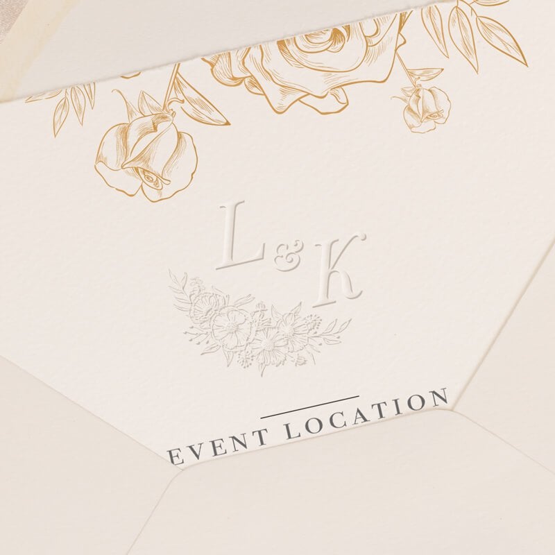 Wedding invitation shown stamped with embossed design