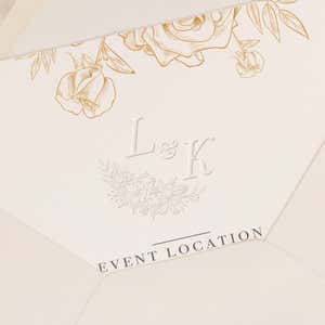 Wedding invitation shown stamped with embossed design