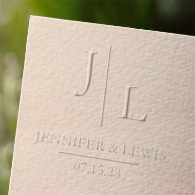 Sample impression of a Modern Minimal Wedding Embosser with custom initals, names, and date