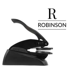 Professional black embosser shown beside a sample impression of the wedding design