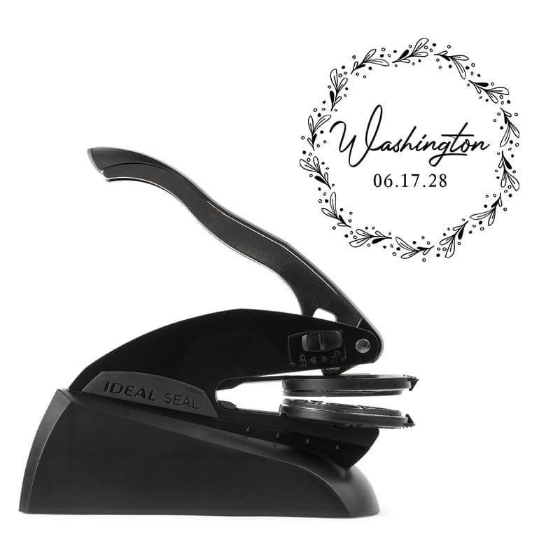 Professional black embosser shown beside a sample impression print