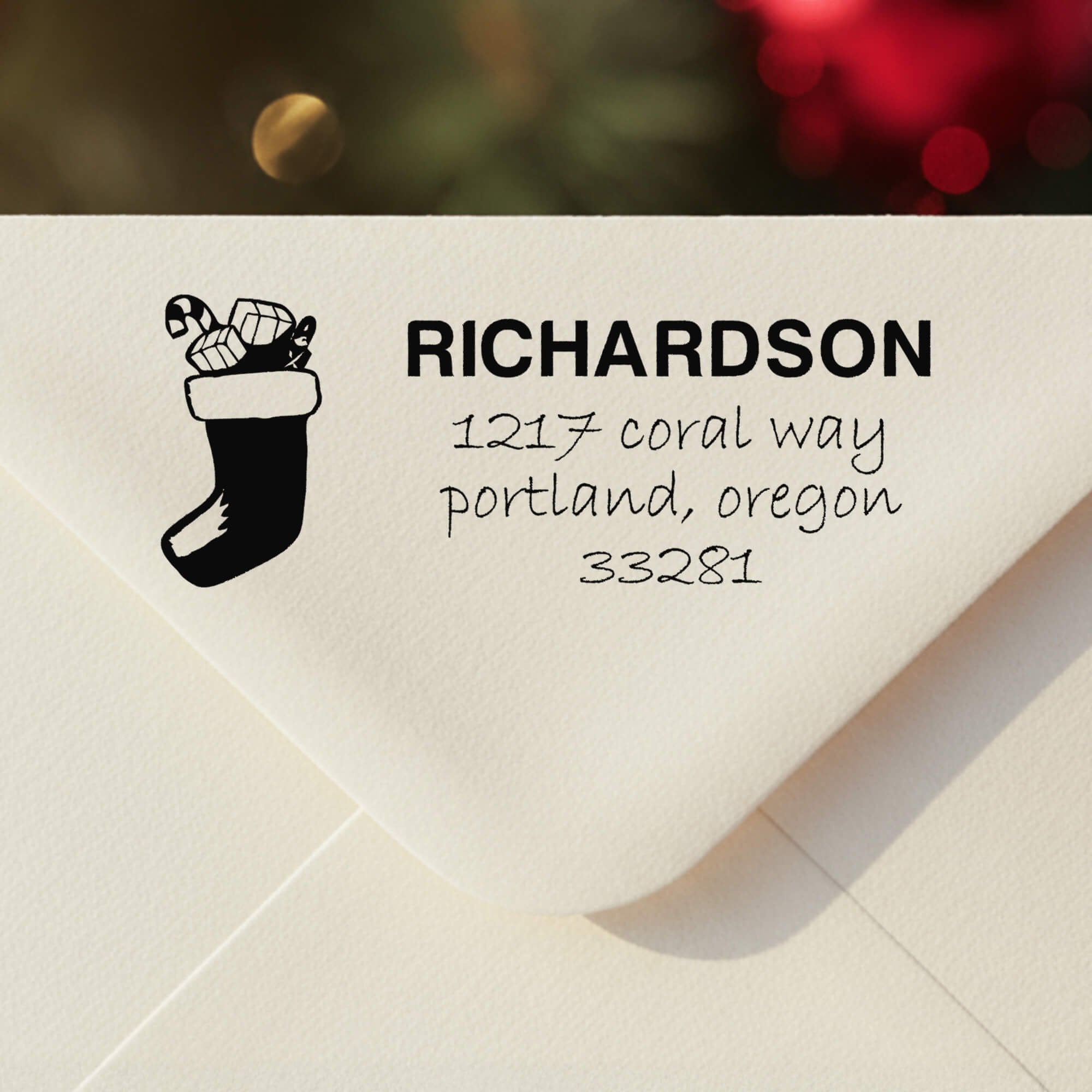 Personalized ‘Richardson Stocking’ address stamp impression on envelope flap for holiday cards.