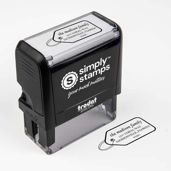 Top angle view of self-inking holiday stamp with ‘Madison Gift Tag’ address design.