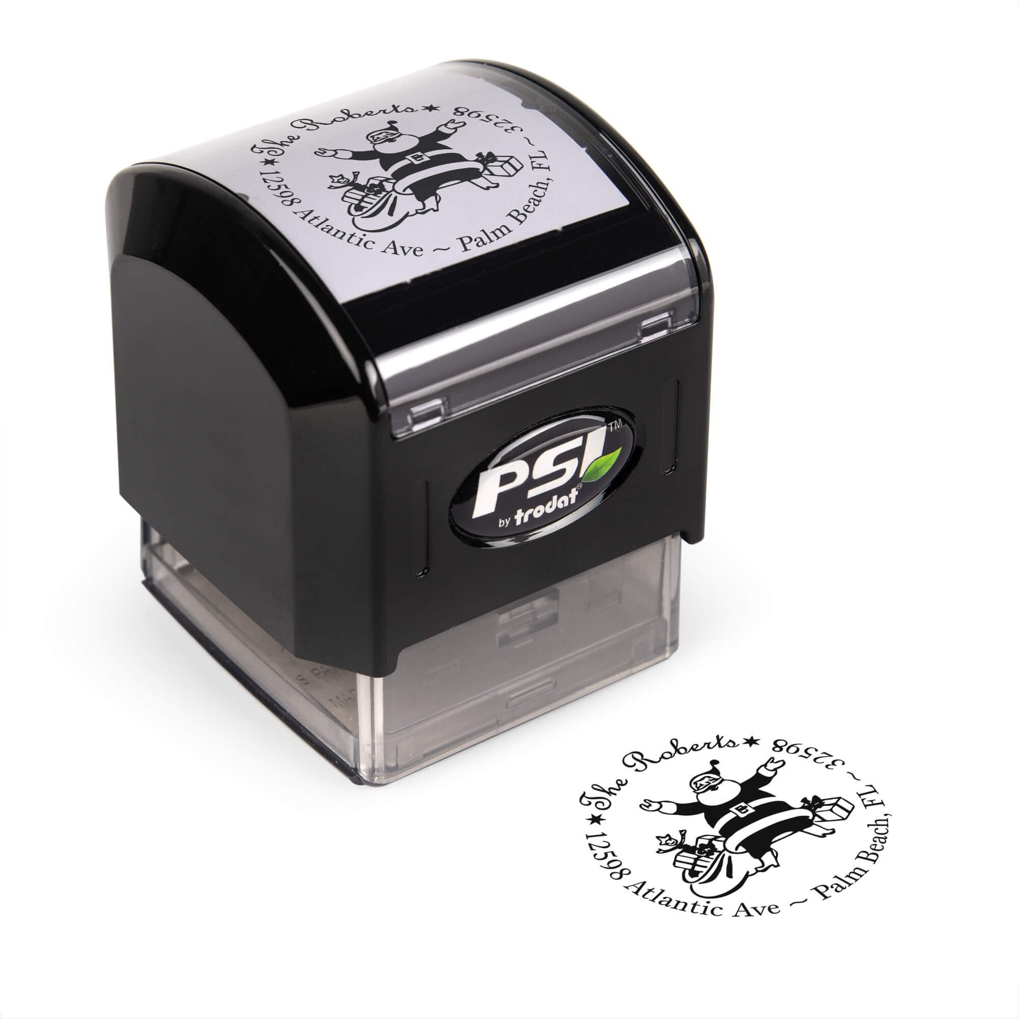 Pre-inked stamp shown from above featuring custom ‘Roberts Santa Round’  holiday return address design.