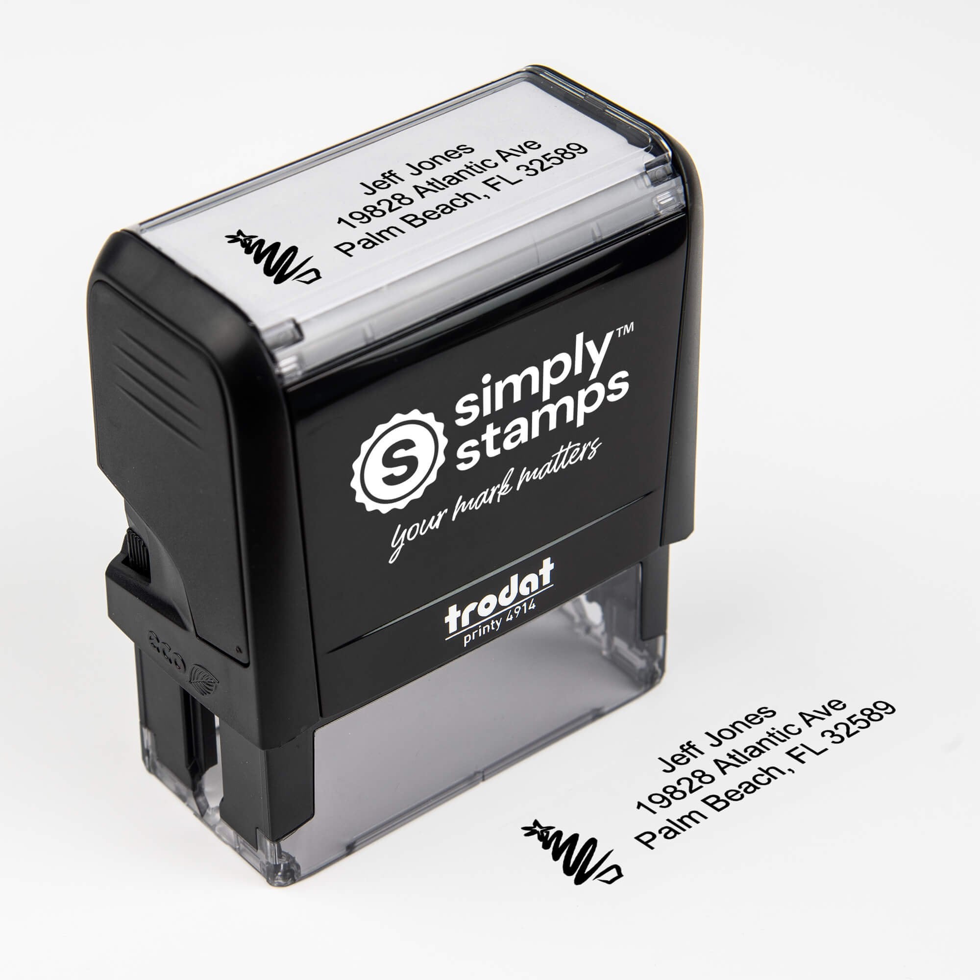 Top angle view of self-inking holiday stamp with circular ‘Holiday Custom Icon’ address design.