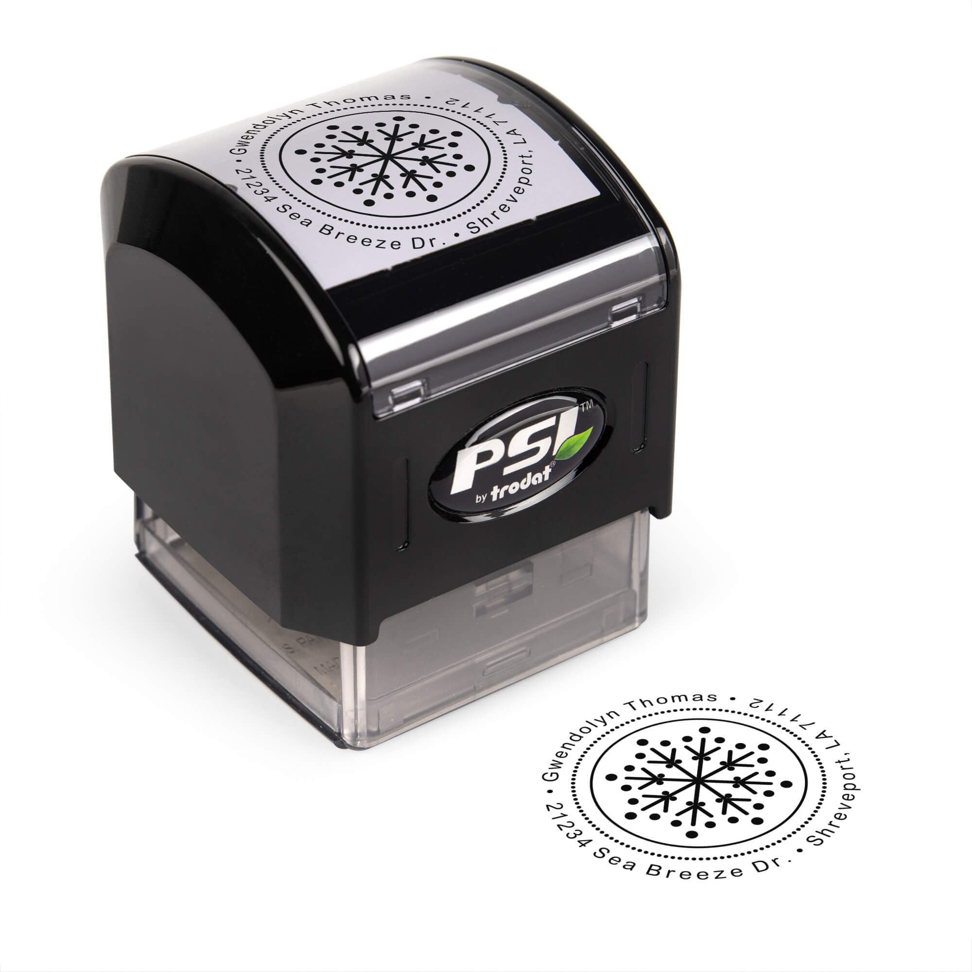Pre-inked stamp shown from above featuring custom ‘Dotted Snowflake’  holiday return address design.