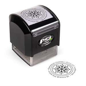 Pre-inked stamp shown from above featuring custom ‘Dotted Snowflake’  holiday return address design.