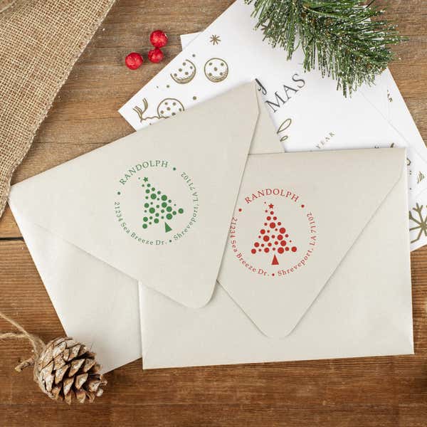 Green and red ink impressions of ‘Polka Dot Christmas Tree’ return address stamp on Christmas envelopes.