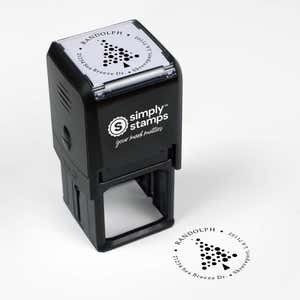 Top angle view of self-inking holiday stamp with circular ‘Polka Dot Christmas Tree’ address design.