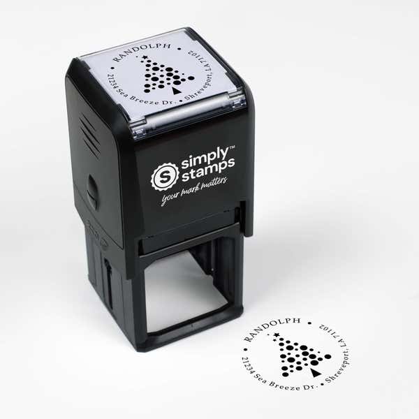 Top angle view of self-inking holiday stamp with circular ‘Polka Dot Christmas Tree’ address design.