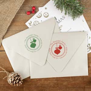 Green and red ink impressions of ‘Randolph Christmas Ornaments’ return address stamp on Christmas envelopes.