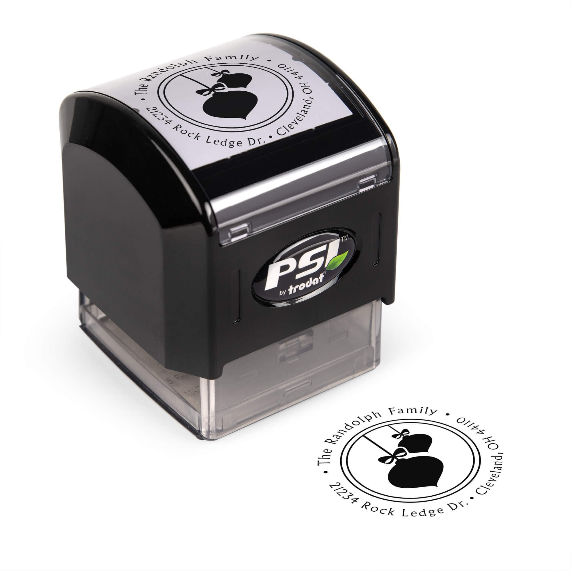 Pre-inked stamp shown from above featuring custom ‘Randolph Christmas Ornaments’  holiday return address design.