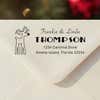 Personalized ‘Rudolph Reindeer’ address stamp impression on envelope flap for holiday cards.