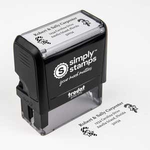 Top angle view of self-inking holiday stamp with circular ‘Carpenter Candy Cane’ address design.