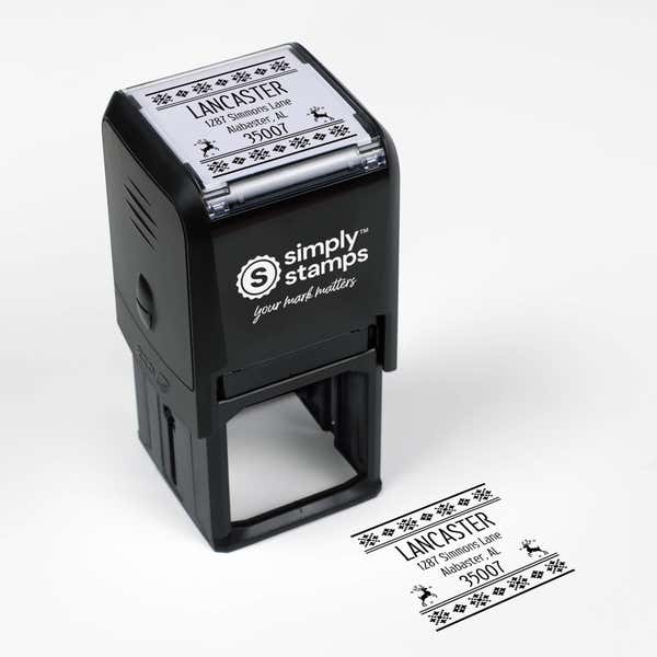 Top angle view of self-inking holiday stamp with ‘Designer Reindeer’ address design.