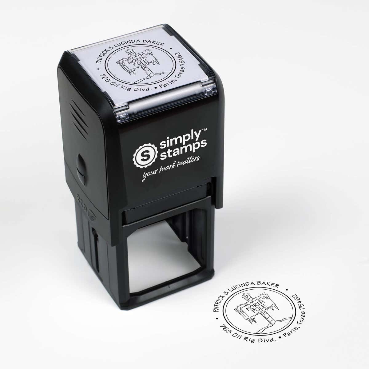 Top angle view of self-inking holiday stamp with circular ‘North Pole’ address design.