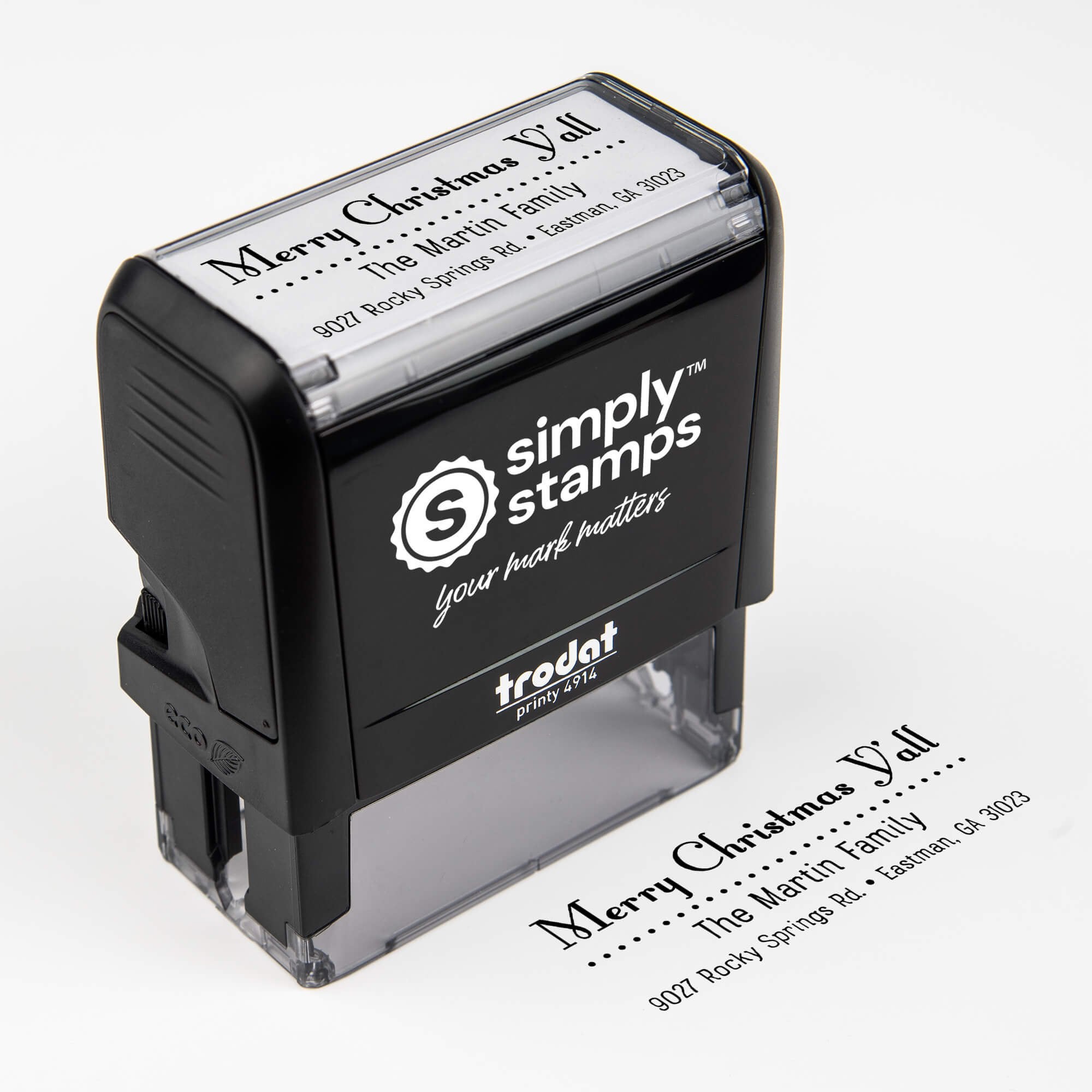 Top angle view of self-inking holiday stamp with circular ‘Merry Christmas Y’all’ address design.