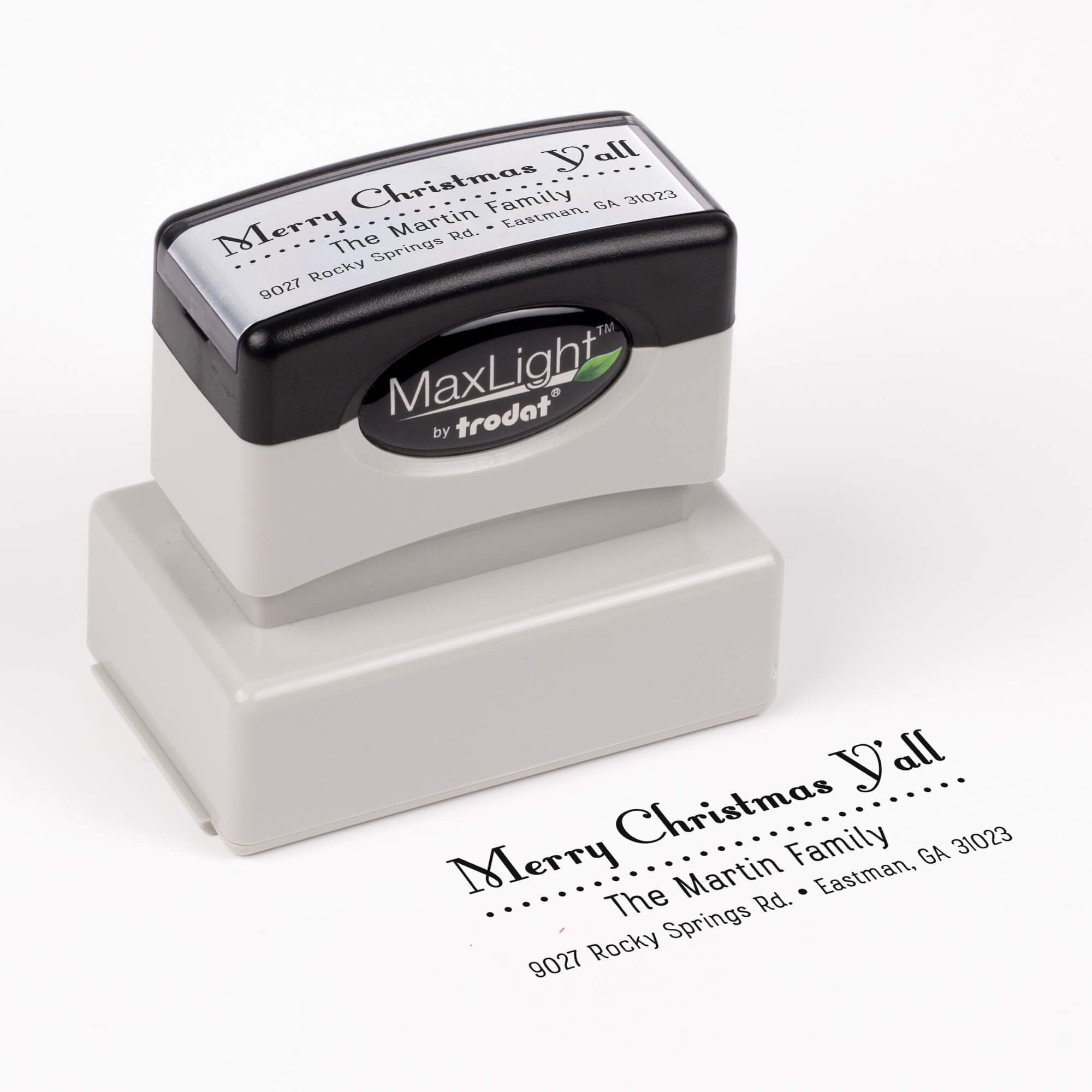 Pre-inked stamp shown from above featuring custom ‘Merry Christmas Y’all’  holiday return address design.