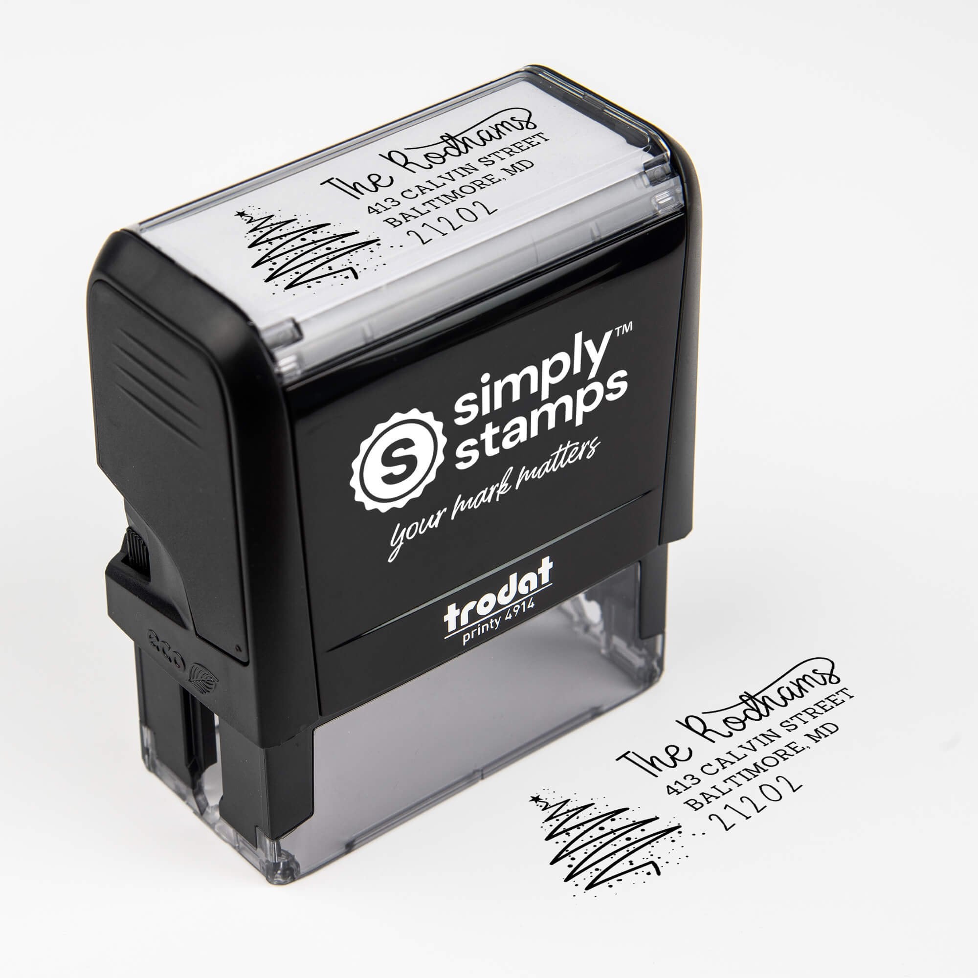 Top angle view of self-inking holiday stamp with ‘Rodham Script Christmas Tree’ address design.