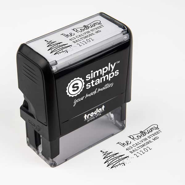 Top angle view of self-inking holiday stamp with ‘Rodham Script Christmas Tree’ address design.