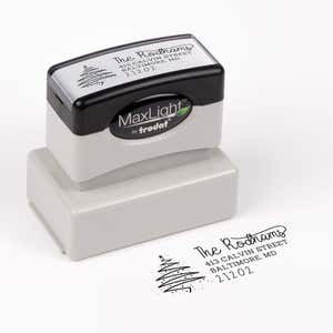 Pre-inked stamp shown from above featuring custom ‘Rodham Script Christmas Tree’  holiday return address design.