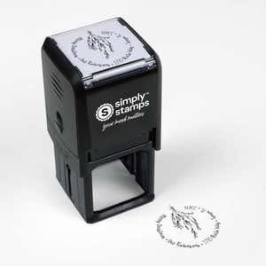Top angle view of self-inking holiday stamp with circular ‘Mistletoe Round Script’ address design.