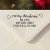 Personalized ‘Merry Christmas Decorative Swirl’ address stamp impression on envelope flap for holiday cards.