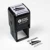 Top angle view of self-inking holiday stamp with circular ‘Griswold Holiday’ address design.