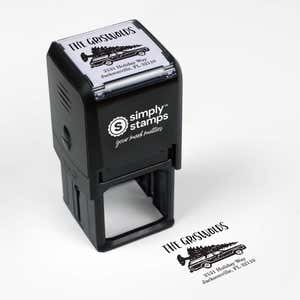 Top angle view of self-inking holiday stamp with circular ‘Griswold Holiday’ address design.