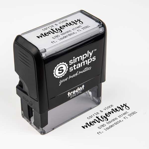 Top angle view of self-inking holiday stamp with circular ‘Montgomery Trendy’ address design.