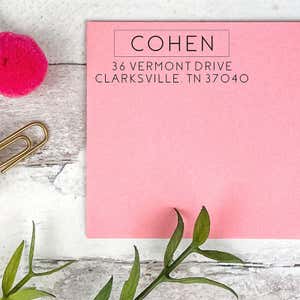 Pink envelope showing the Thin San Serif Address Stamp impression
