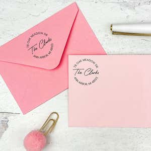 The impression from the Photograph Signature Address Stamp printed on two envelopes