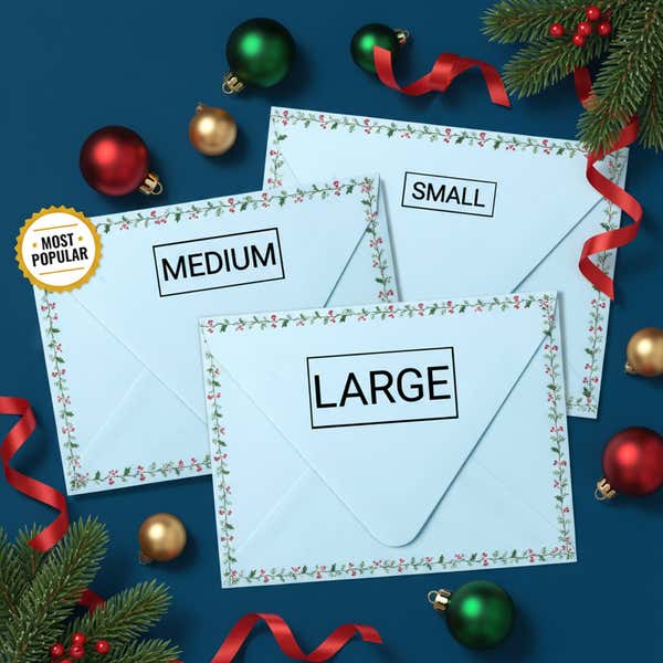 Holiday-themed envelopes displaying small, medium, and large self-inking stamp impression sizes surrounded by ornaments and ribbon.