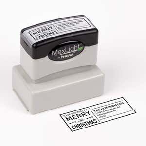 Pre-inked stamp shown from above featuring custom ‘Have Yourself A Merry Little Christmas’  holiday return address design.