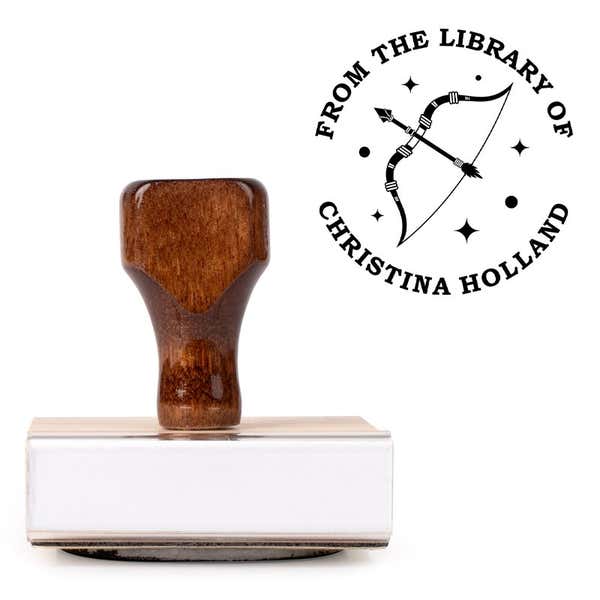 Front view of wood handle stamp body with library book stamp impression