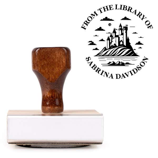 Front view of wood handle stamp body with library book stamp impression