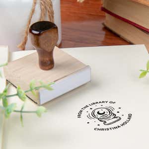 Custom book stamp on paper with wood handle stamp body