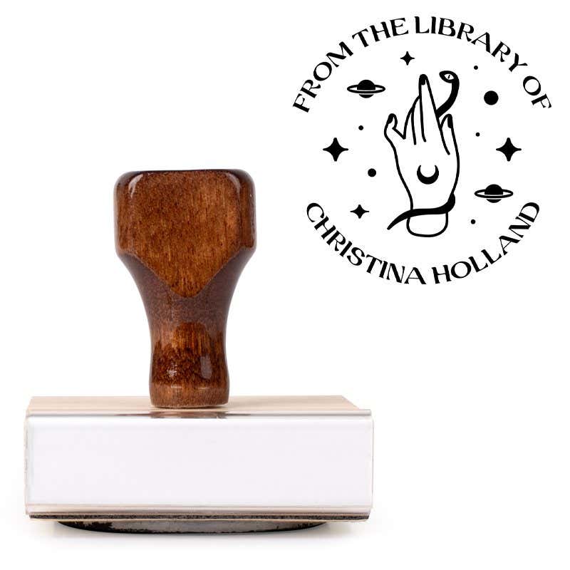 Front view of wood handle stamp body with library book stamp impression
