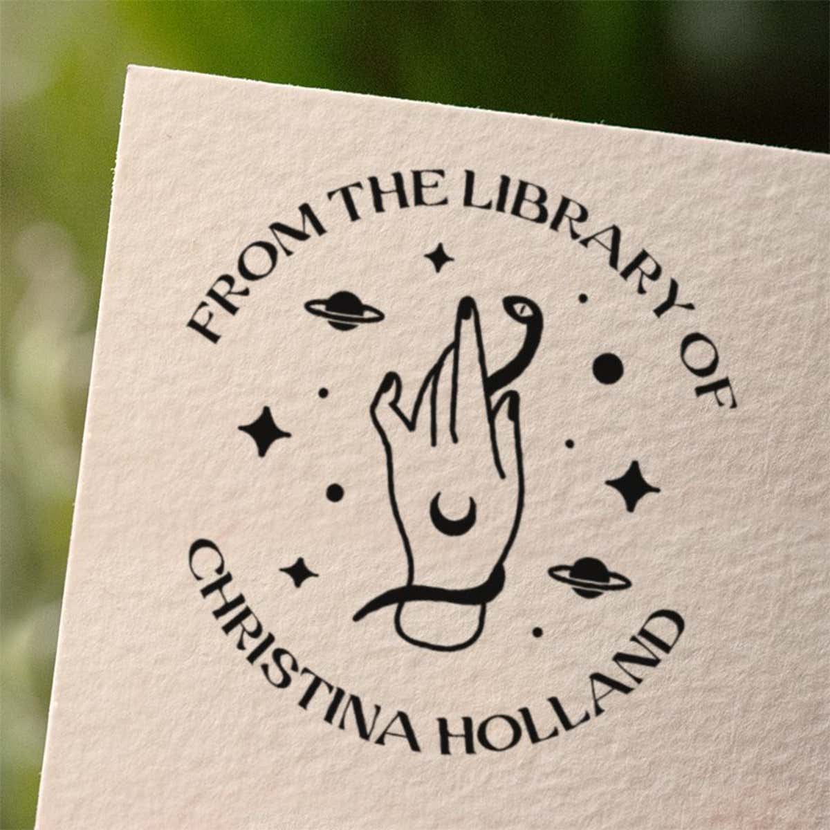 Personalized book stamp impression on white paper