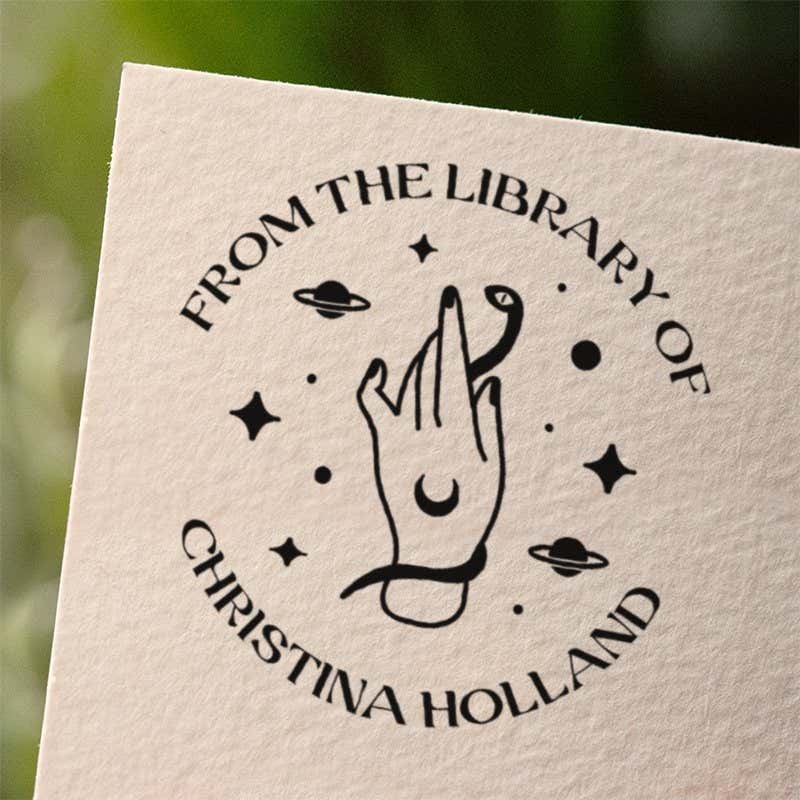 Personalized book stamp impression on white paper