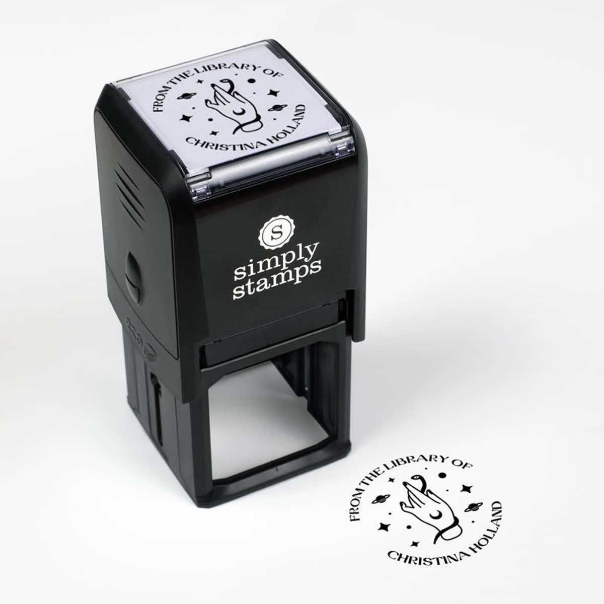 Library book stamp impression and self-inking stamp body with white background