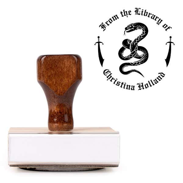 Front view of wood handle stamp body with library book stamp impression