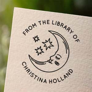 Personalized book stamp impression on white paper