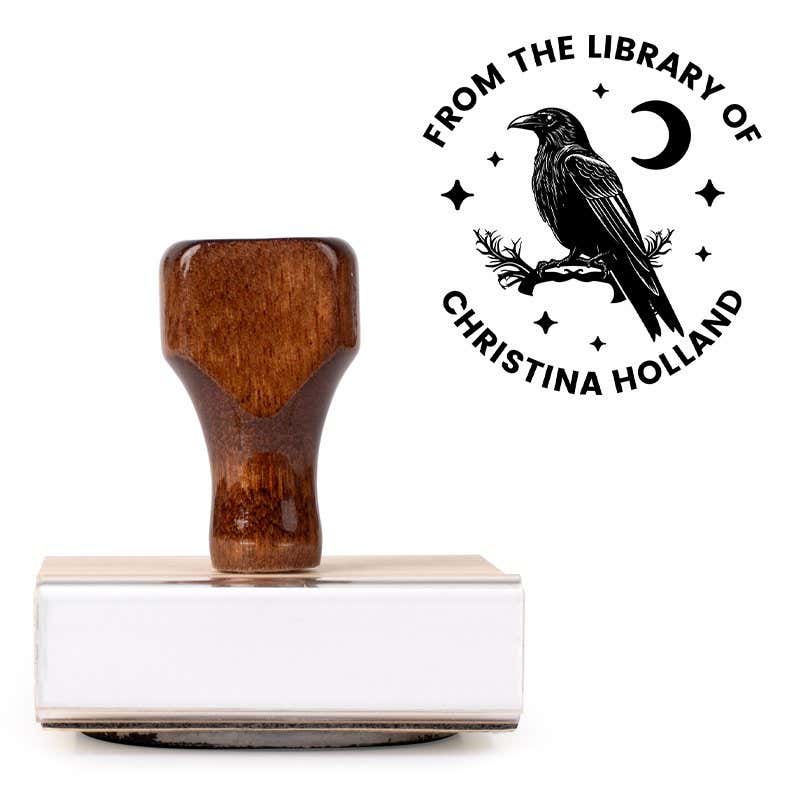Front view of wood handle stamp body with library book stamp impression