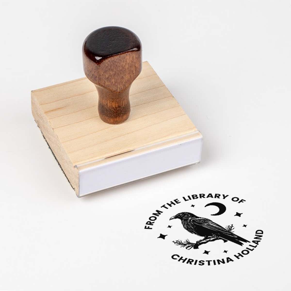 Wood handle stamp body with book stamp impression